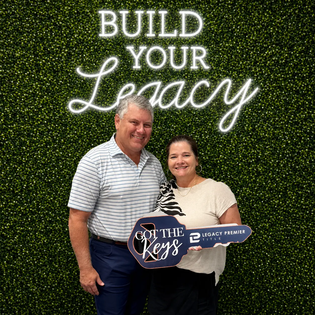 A couple celebrating their new home closing