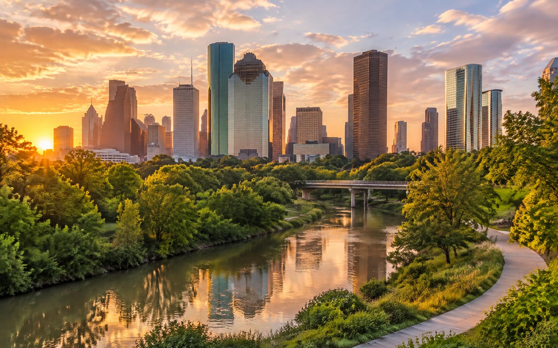 Houston skyline at golden hour over Buffalo Bayou Park